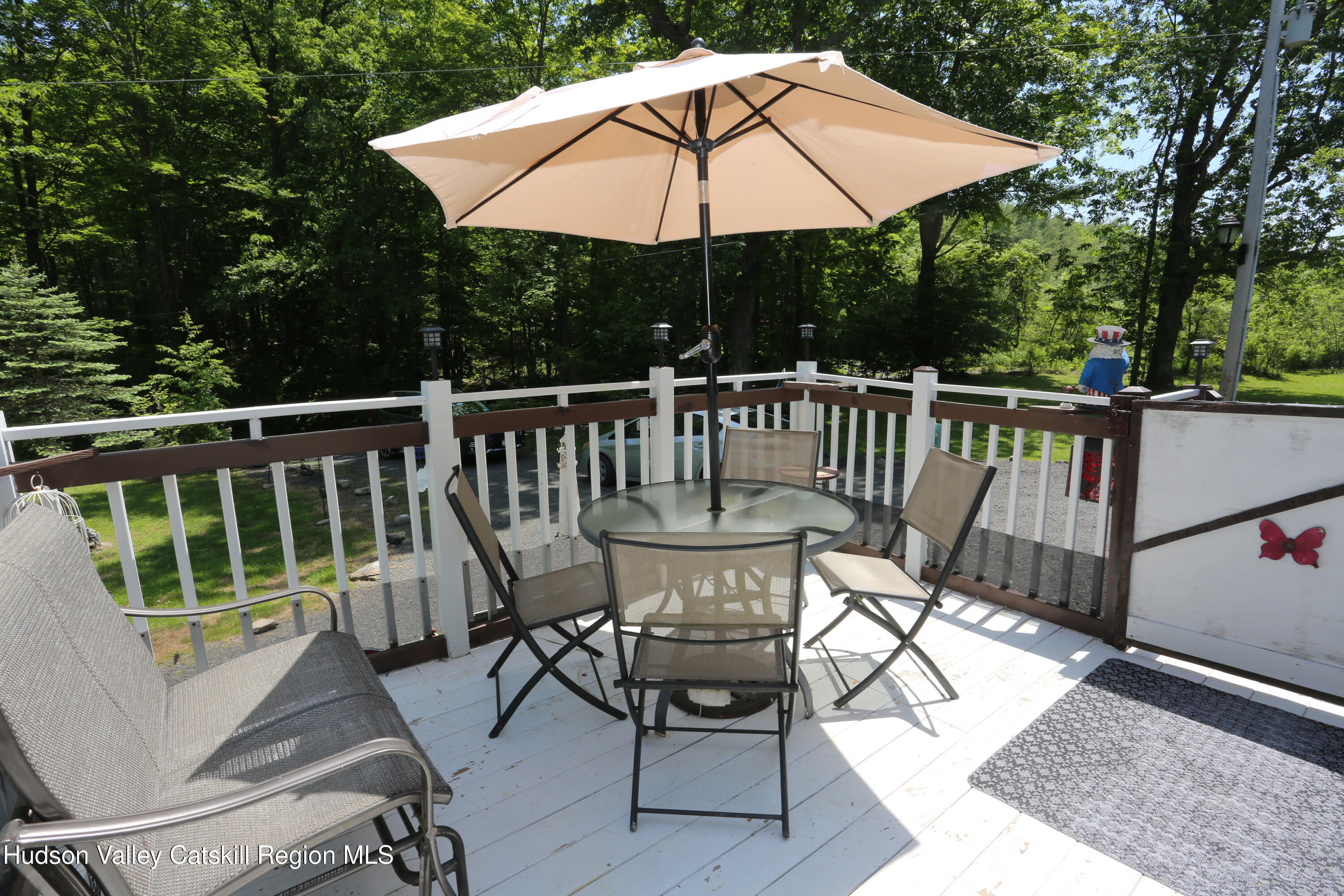 219 Edison Timmerman Road Cairo, NY 12413 - Photo 31 of 51 a view of a chair and table on the deck