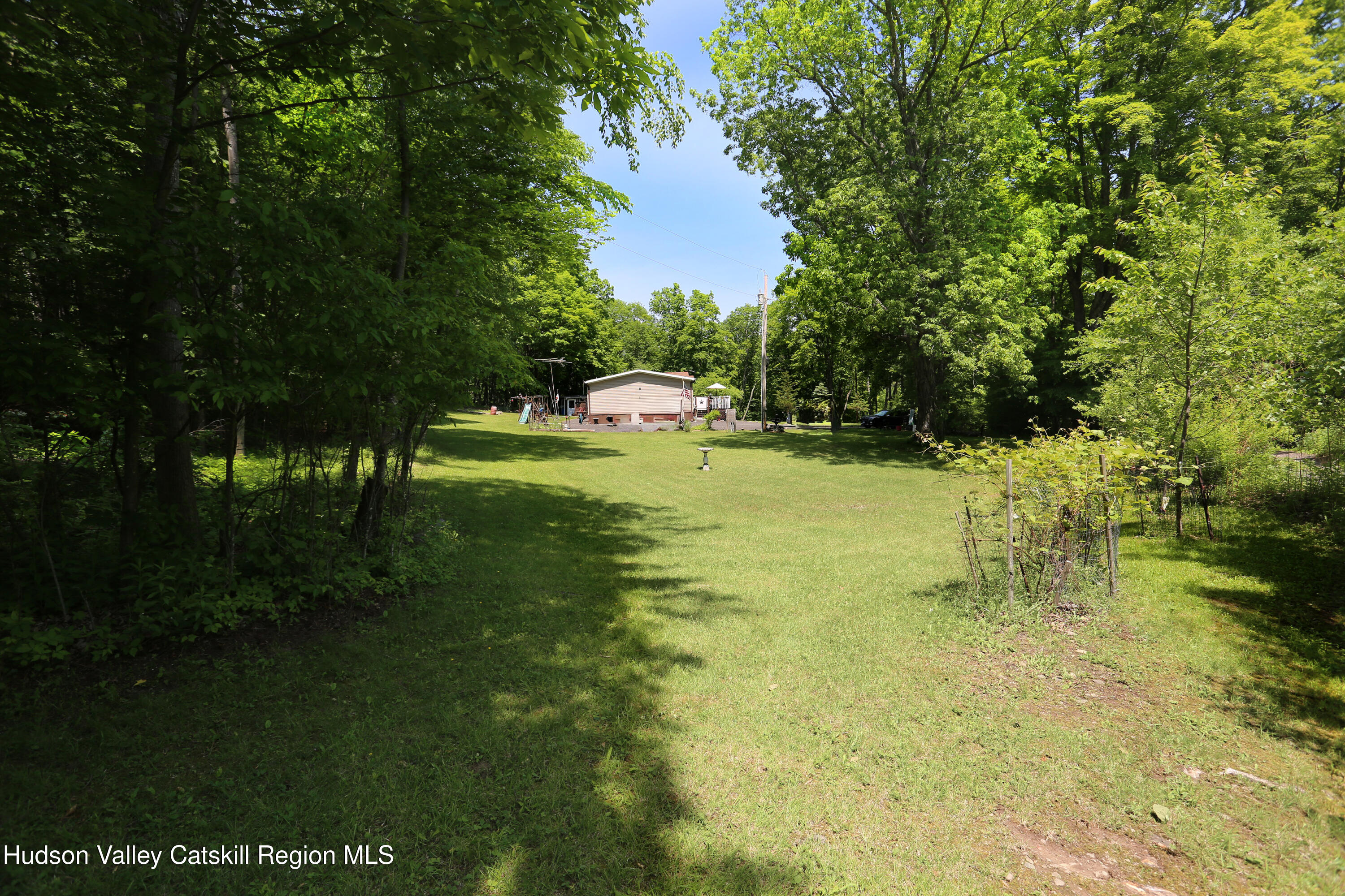 219 Edison Timmerman Road Cairo, NY 12413 - Photo 39 of 51 a swimming pool with outdoor seating and yard
