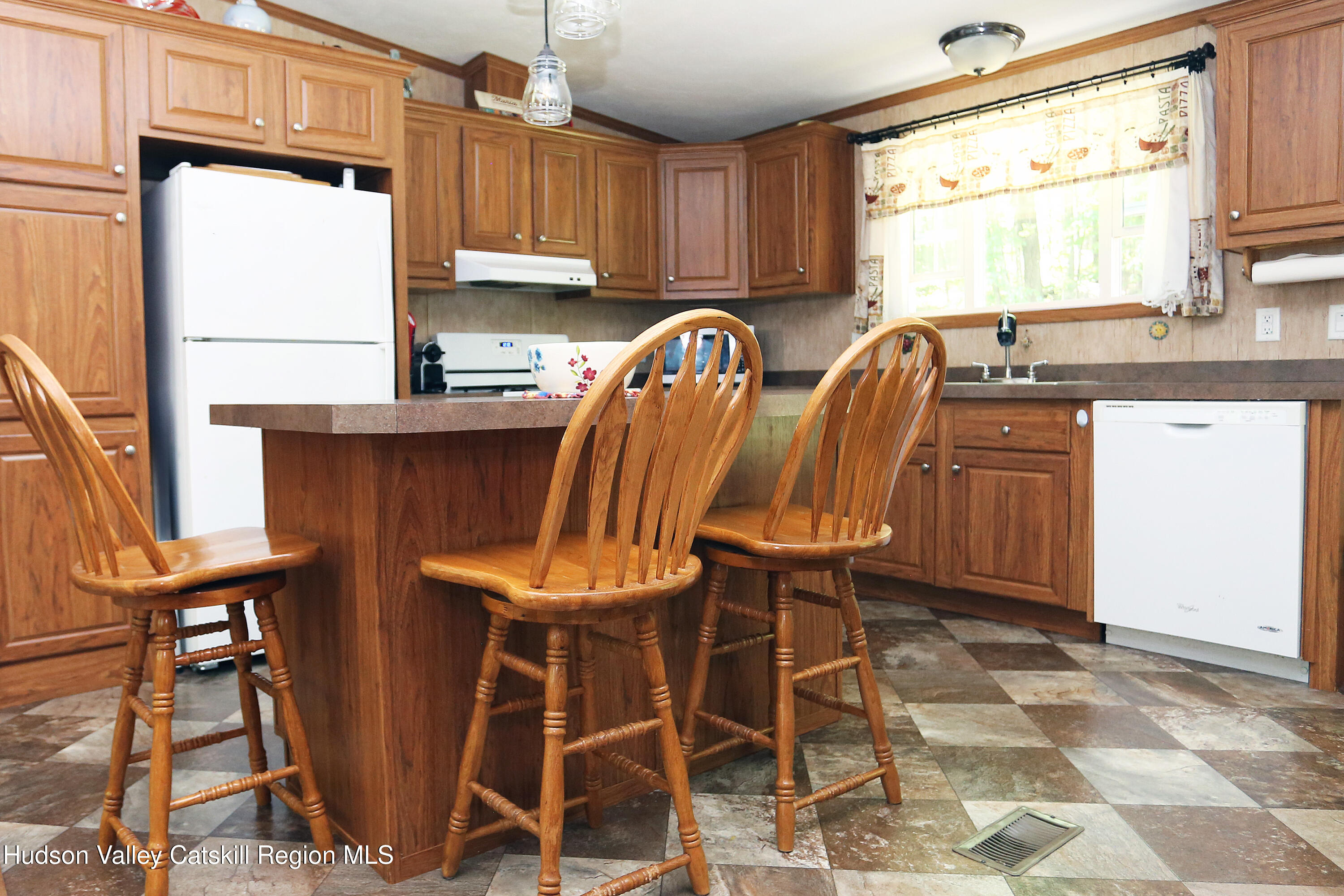 219 Edison Timmerman Road Cairo, NY 12413 - Photo 4 of 51 a view of a kitchen area with furniture and windows