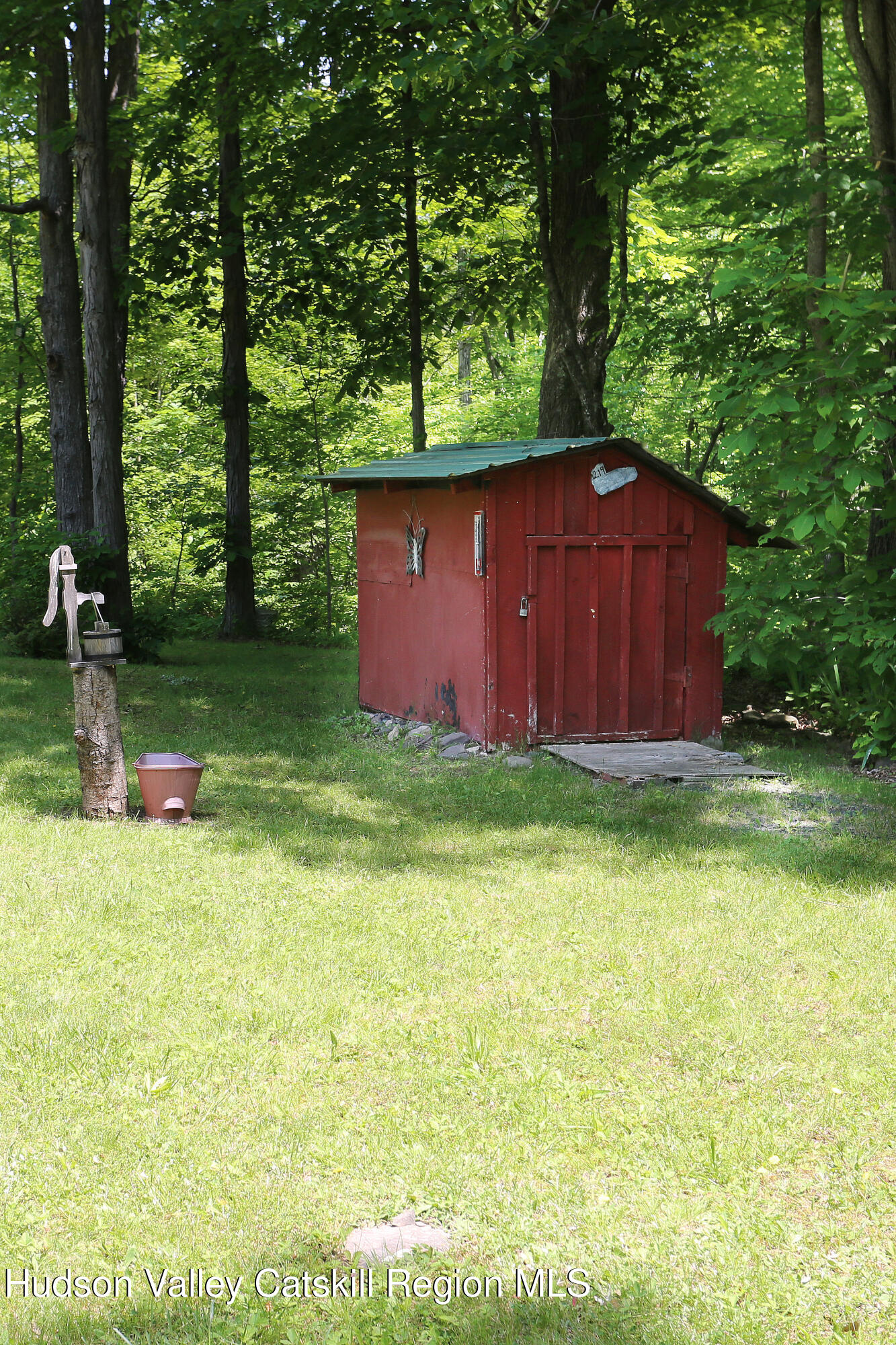 219 Edison Timmerman Road Cairo, NY 12413 - Photo 46 of 51 a view of backyard with large tree and wooden fence