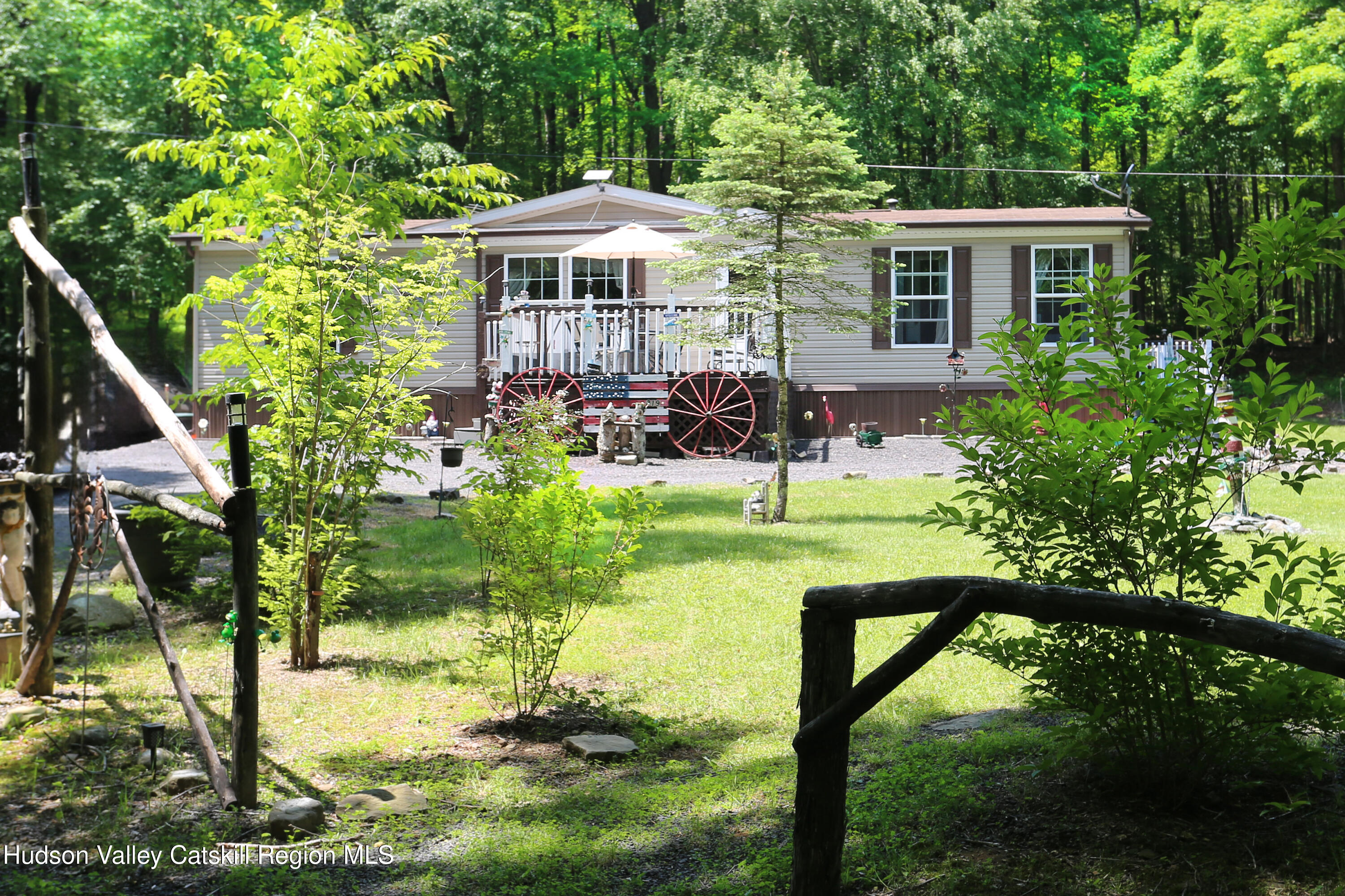 219 Edison Timmerman Road Cairo, NY 12413 - Photo 49 of 51 a view of a house with backyard porch and sitting area