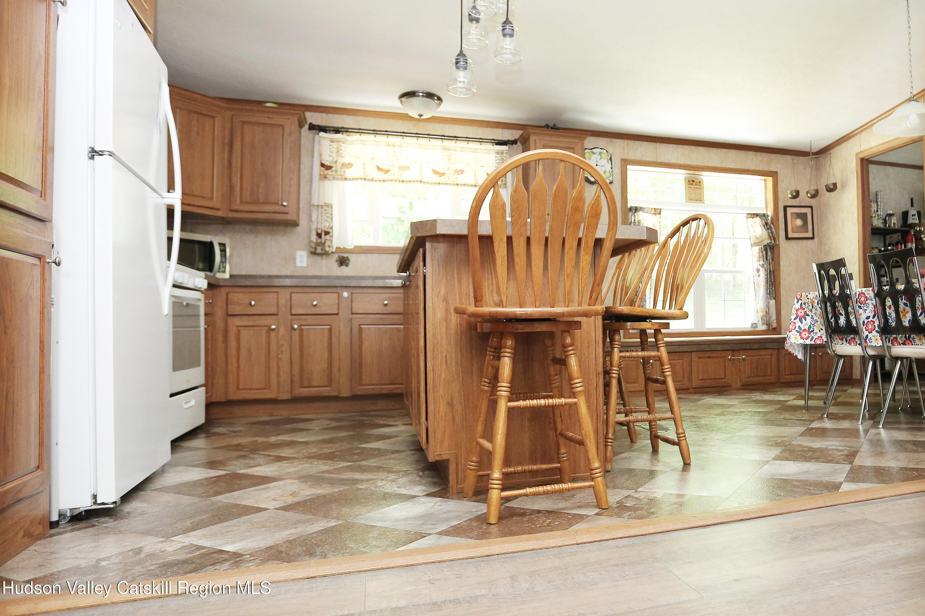 219 Edison Timmerman Road Cairo, NY 12413 - Photo 5 of 51 a kitchen with stainless steel appliances granite countertop a refrigerator and a sink