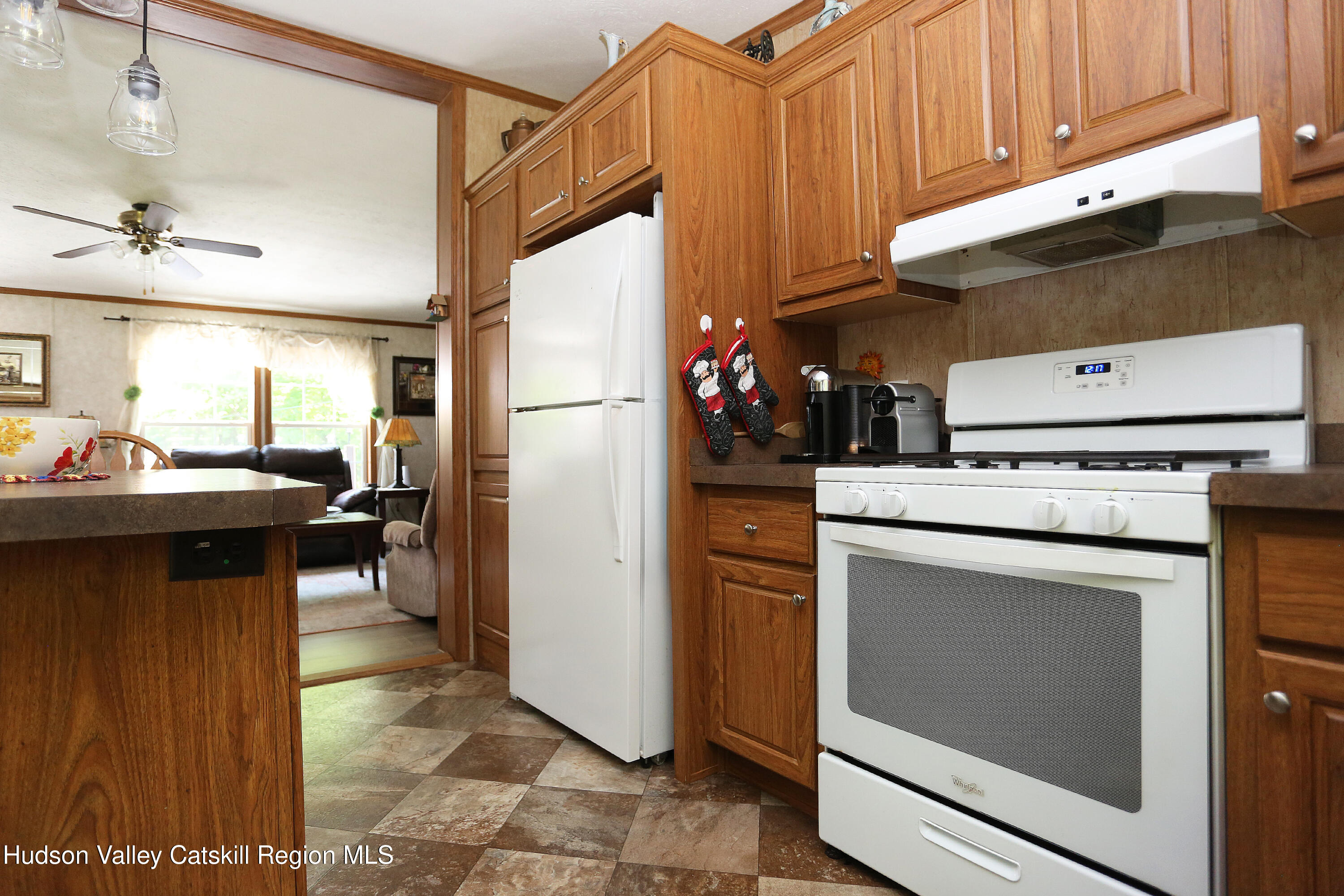 219 Edison Timmerman Road Cairo, NY 12413 - Photo 8 of 51 a kitchen with a refrigerator and a stove