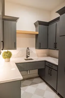 a bathroom with a toilet and a mirror