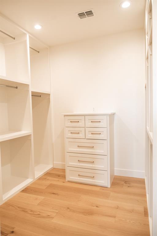 1070 Browning Road Argyle, TX 76226 - Photo 13 of 21 Walk in closet featuring light wood-type flooring