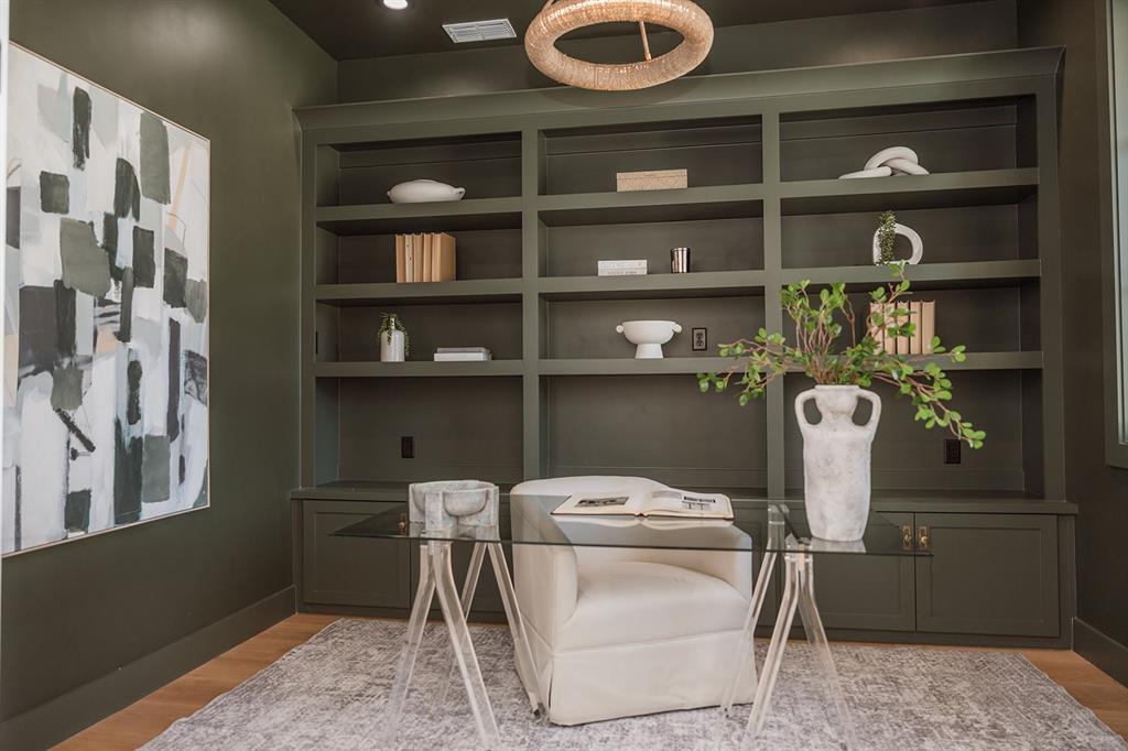 1070 Browning Road Argyle, TX 76226 - Photo 8 of 21 Home office featuring light wood finished floors and built in shelves