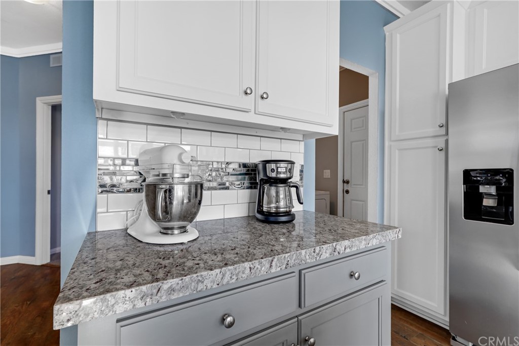 60600 Burnt Valley Road Anza, CA 92539 - Photo 14 of 46 a kitchen with granite countertop a sink and cabinets