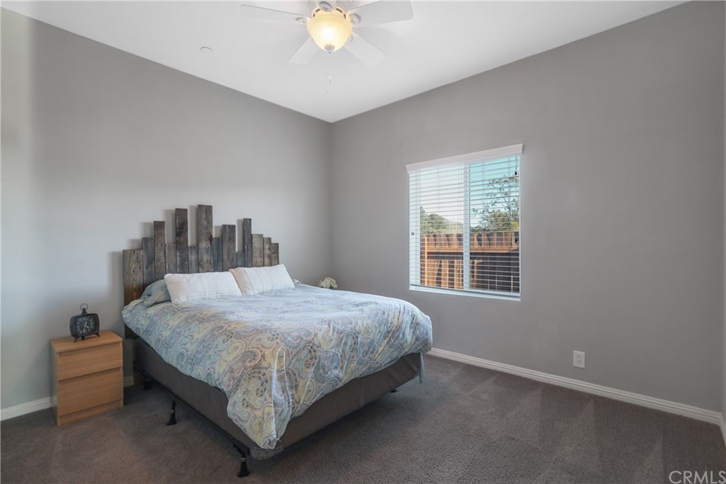 60600 Burnt Valley Road Anza, CA 92539 - Photo 19 of 46 a bedroom with a bed and a window