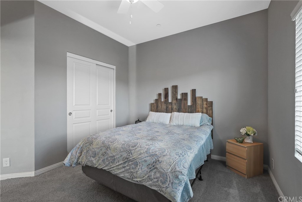 60600 Burnt Valley Road Anza, CA 92539 - Photo 20 of 46 a bedroom with a bed and a table in it