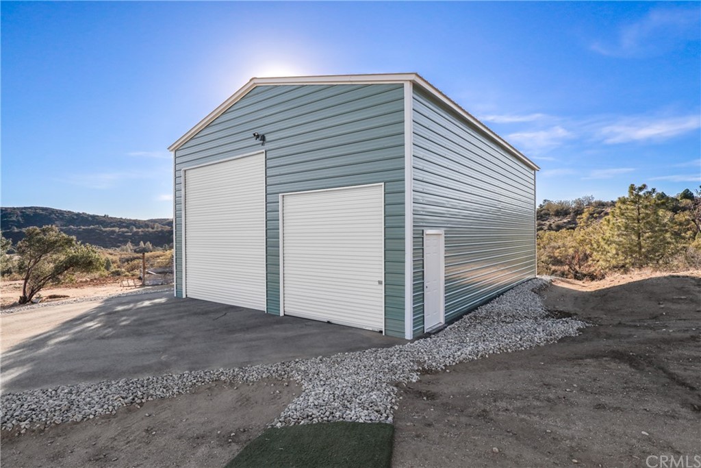 60600 Burnt Valley Road Anza, CA 92539 - Photo 25 of 46 a view of a house with a yard