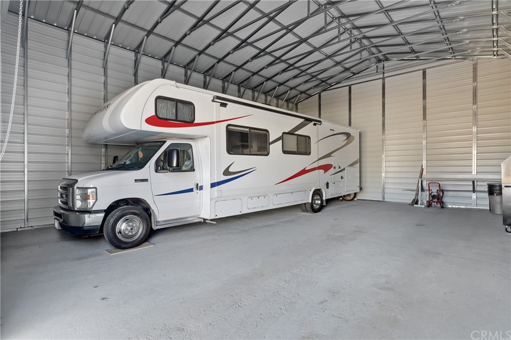 60600 Burnt Valley Road Anza, CA 92539 - Photo 26 of 46 a utility room with dryer and car