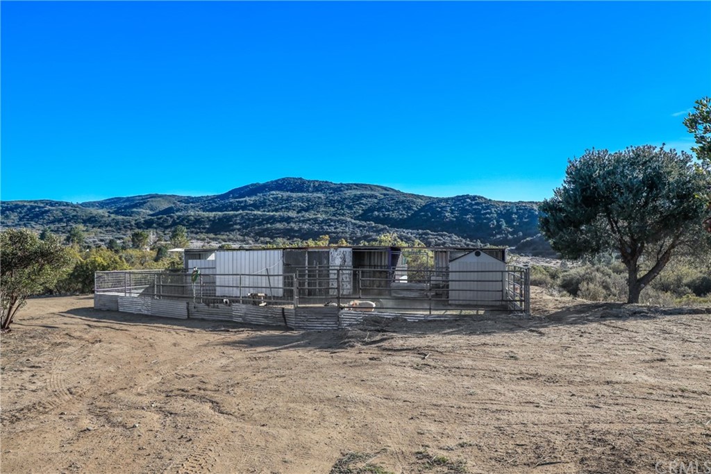 60600 Burnt Valley Road Anza, CA 92539 - Photo 27 of 46 a view of a house with a yard