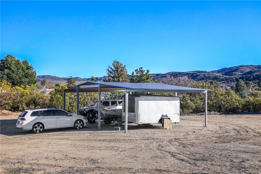 60600 Burnt Valley Road Anza, CA 92539 - Photo 28 of 46 a view of a car park in front of house