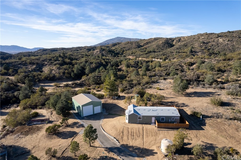 60600 Burnt Valley Road Anza, CA 92539 - Photo 31 of 46 an aerial view of a house with a mountain