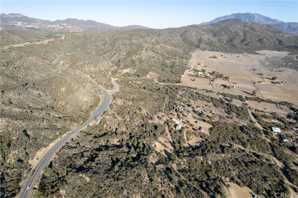 60600 Burnt Valley Road Anza, CA 92539 - Photo 34 of 46 a view of a mountain range with a lush green hillside