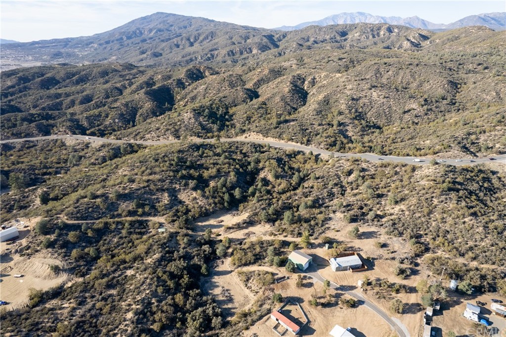 60600 Burnt Valley Road Anza, CA 92539 - Photo 38 of 46 an aerial view of house with a forest