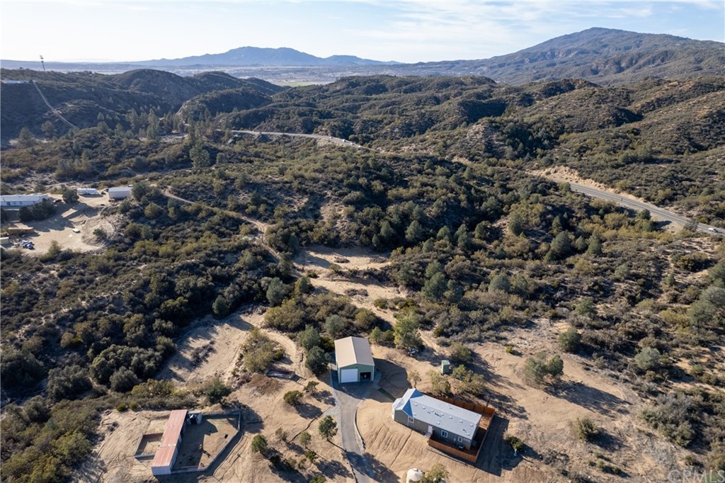 60600 Burnt Valley Road Anza, CA 92539 - Photo 39 of 46 an aerial view of residential house and sandy dunes