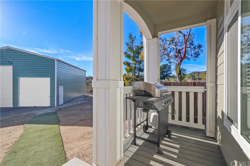 60600 Burnt Valley Road Anza, CA 92539 - Photo 4 of 46 a view of a hallway with wooden floor and windows