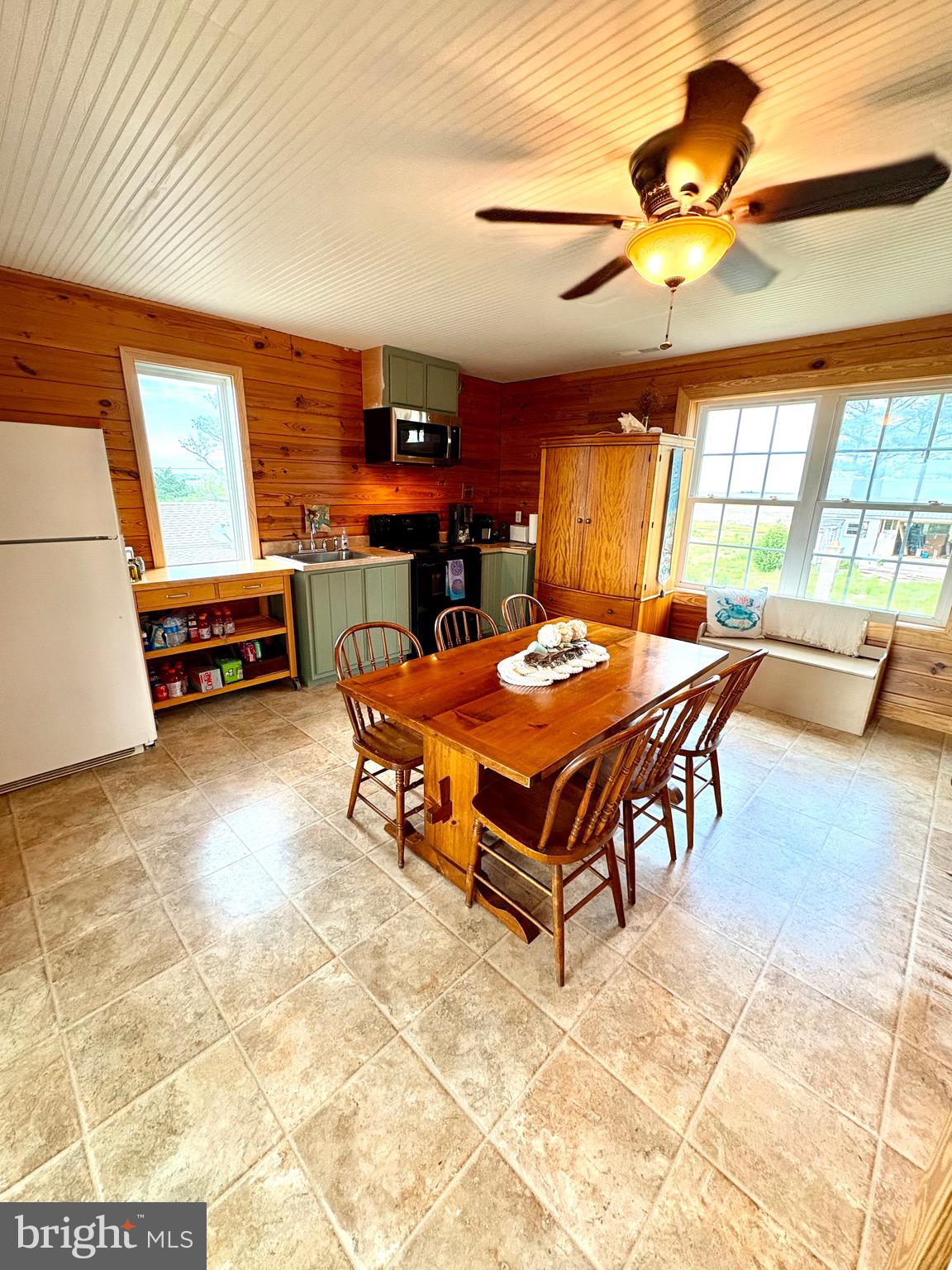 3419 Marsh Road Ewell, MD 21824 - Photo 15 of 34 a living room with furniture a air conditioner vent and a window