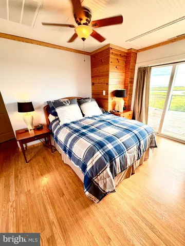 a view of swimming pool with a lounge chair