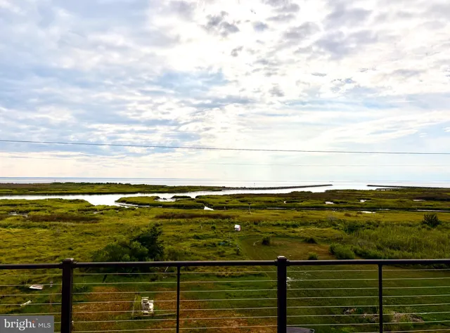 a view of an ocean from a balcony