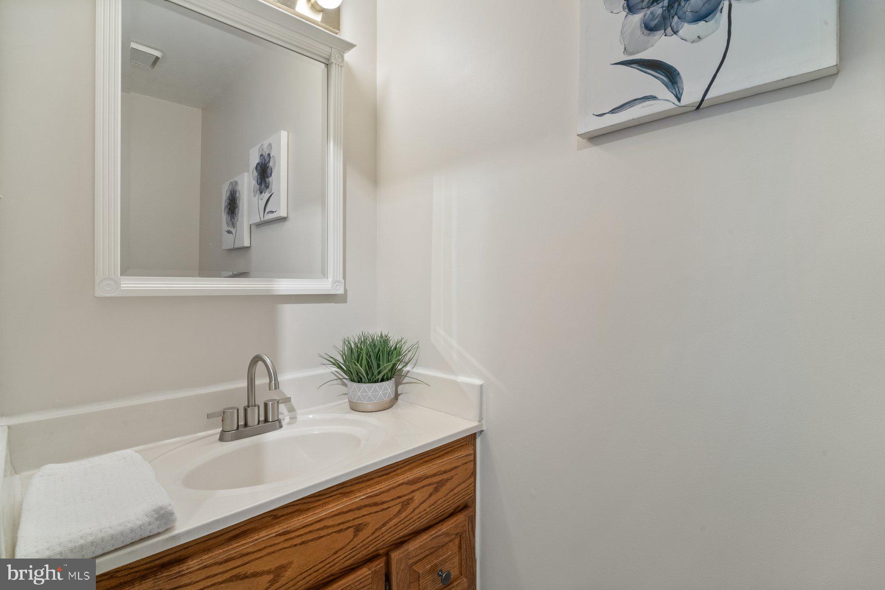 6949 Meadowlake Road New Market, MD 21774 - Photo 21 of 51 Main level powder room.