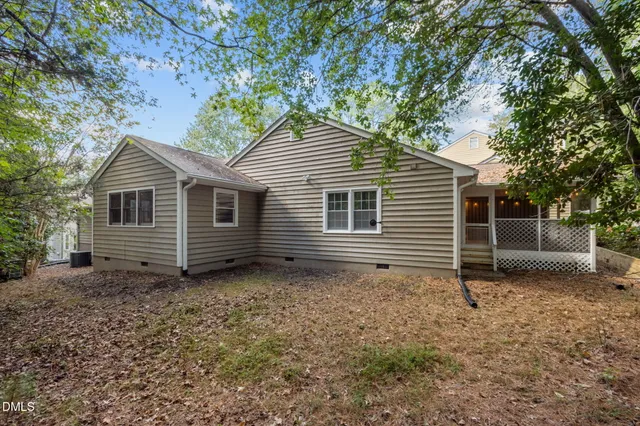 a side view of a house with a door