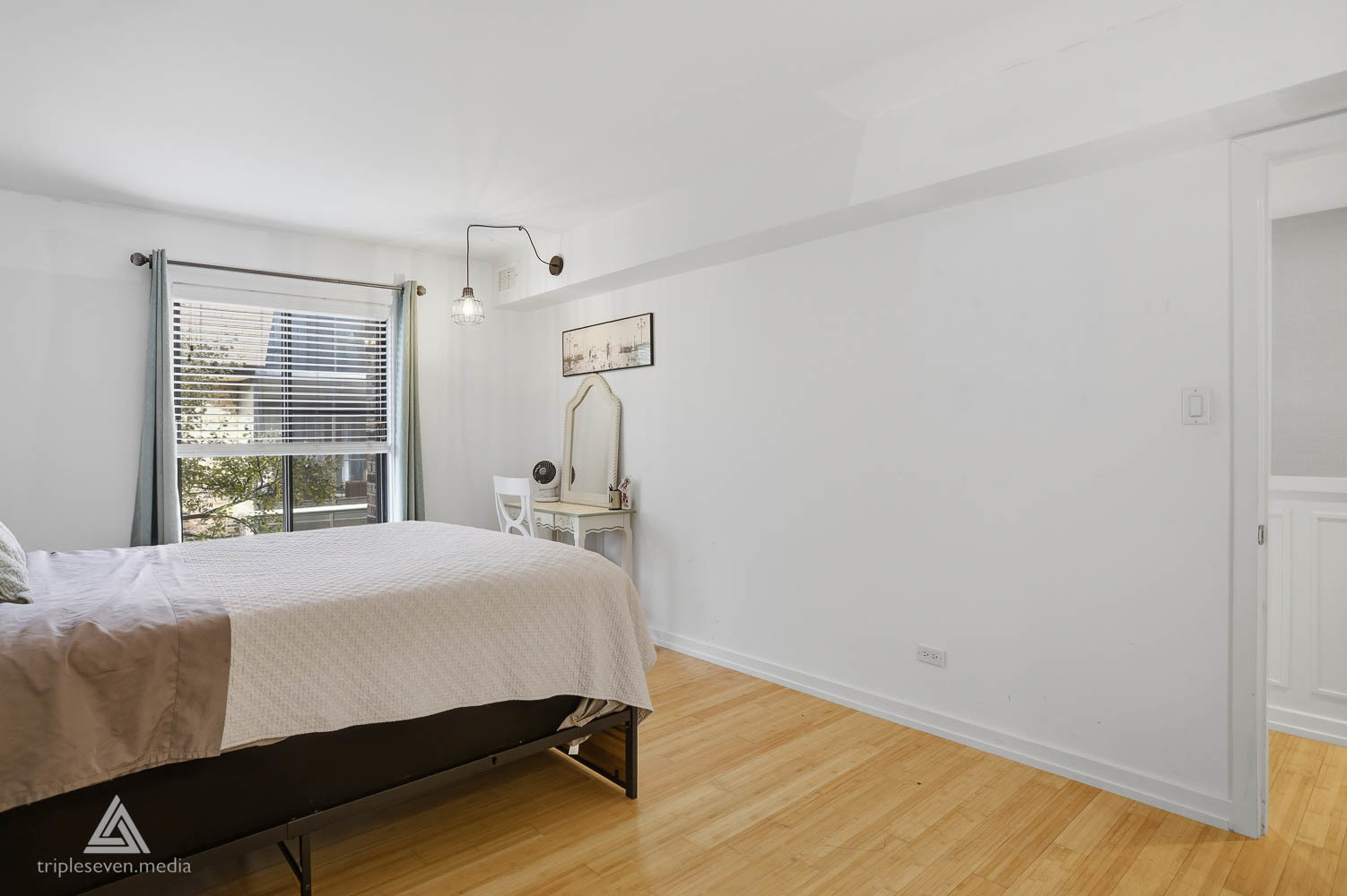 9180 S Road, Unit D Palos Hills, IL 60465 - Photo 13 of 24 a bedroom with a bed and window