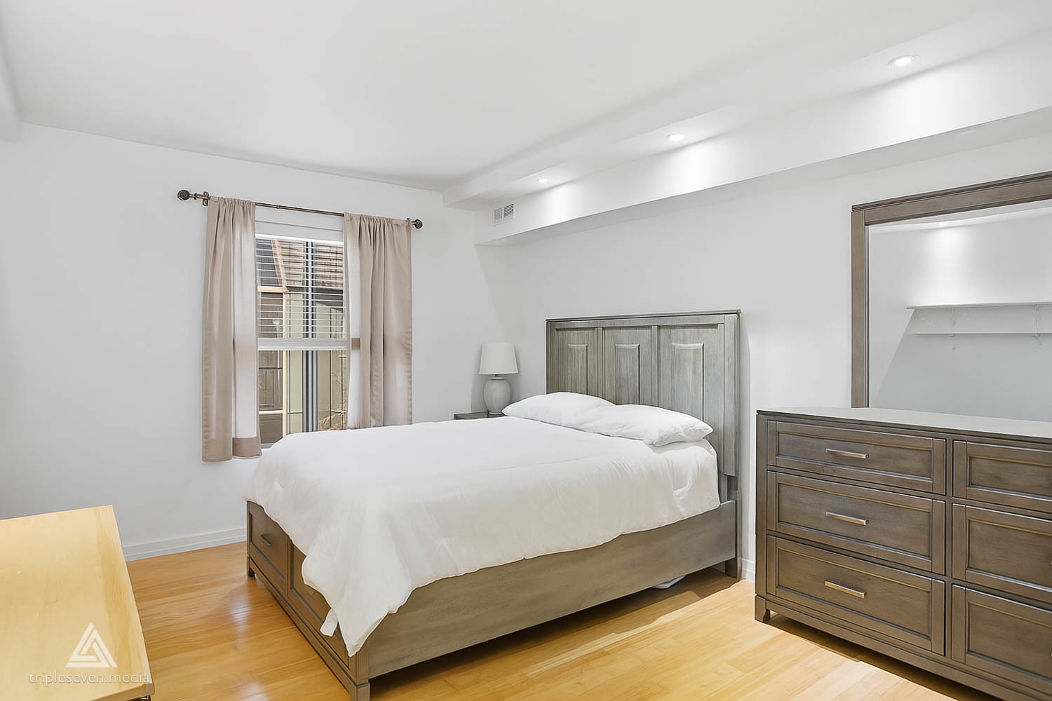 9180 S Road, Unit D Palos Hills, IL 60465 - Photo 17 of 24 a bedroom with a large bed and two windows