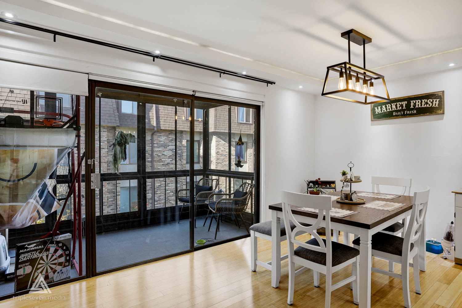 9180 S Road, Unit D Palos Hills, IL 60465 - Photo 5 of 24 a view of a dining room with furniture window and wooden floor