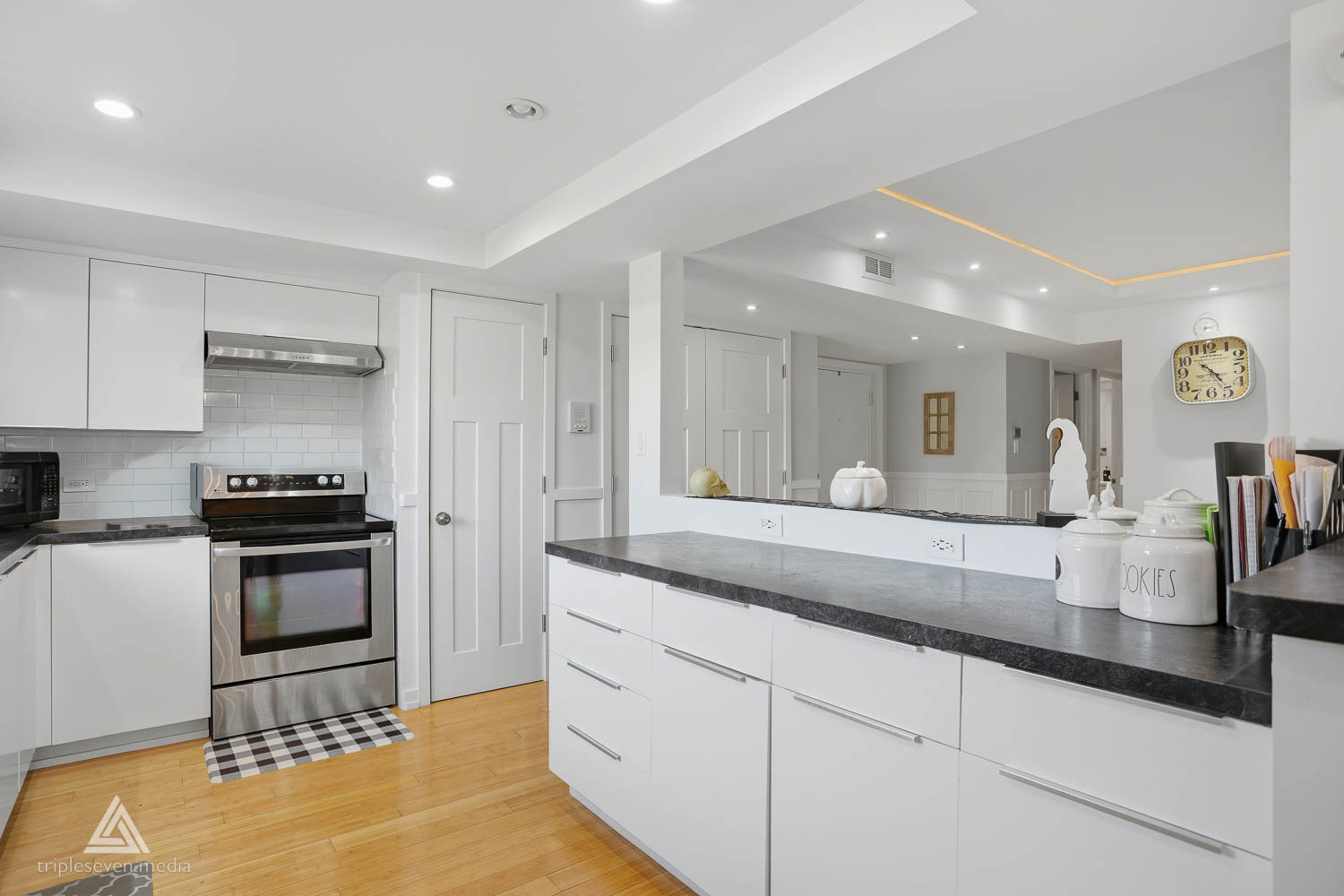 9180 S Road, Unit D Palos Hills, IL 60465 - Photo 7 of 24 a kitchen with stainless steel appliances granite countertop a sink and cabinets