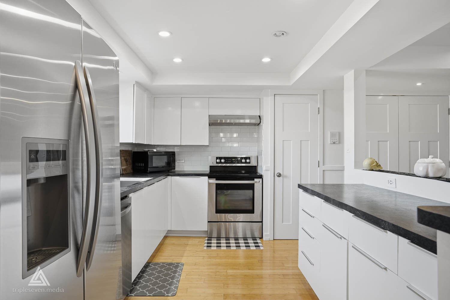 9180 S Road, Unit D Palos Hills, IL 60465 - Photo 8 of 24 a kitchen with stainless steel appliances granite countertop a refrigerator and a sink
