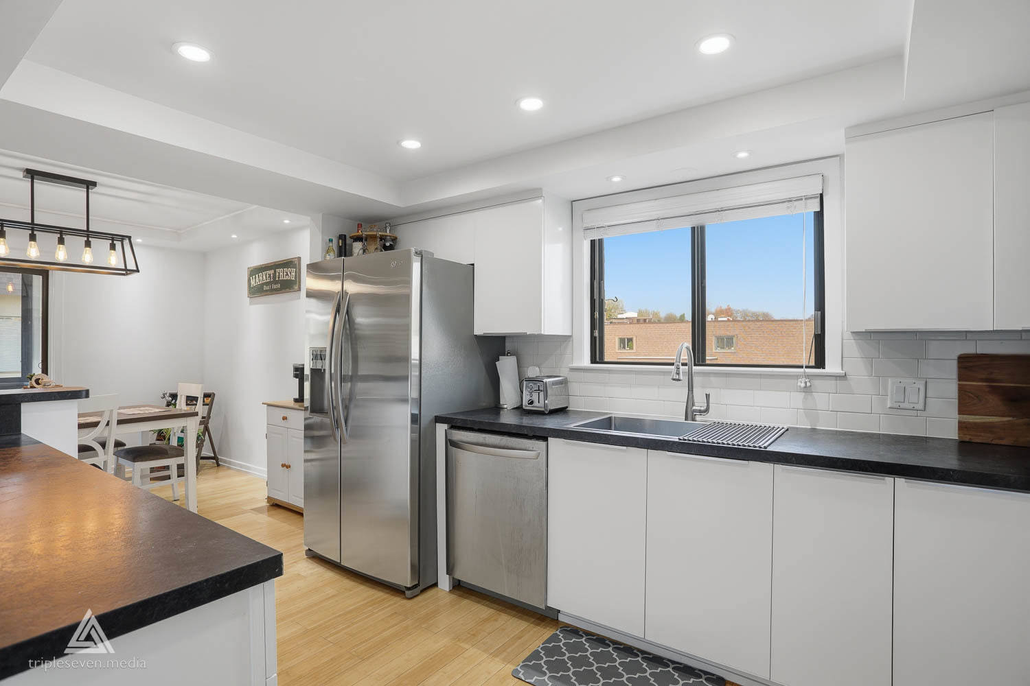 9180 S Road, Unit D Palos Hills, IL 60465 - Photo 9 of 24 a kitchen with granite countertop a sink stainless steel appliances and cabinets