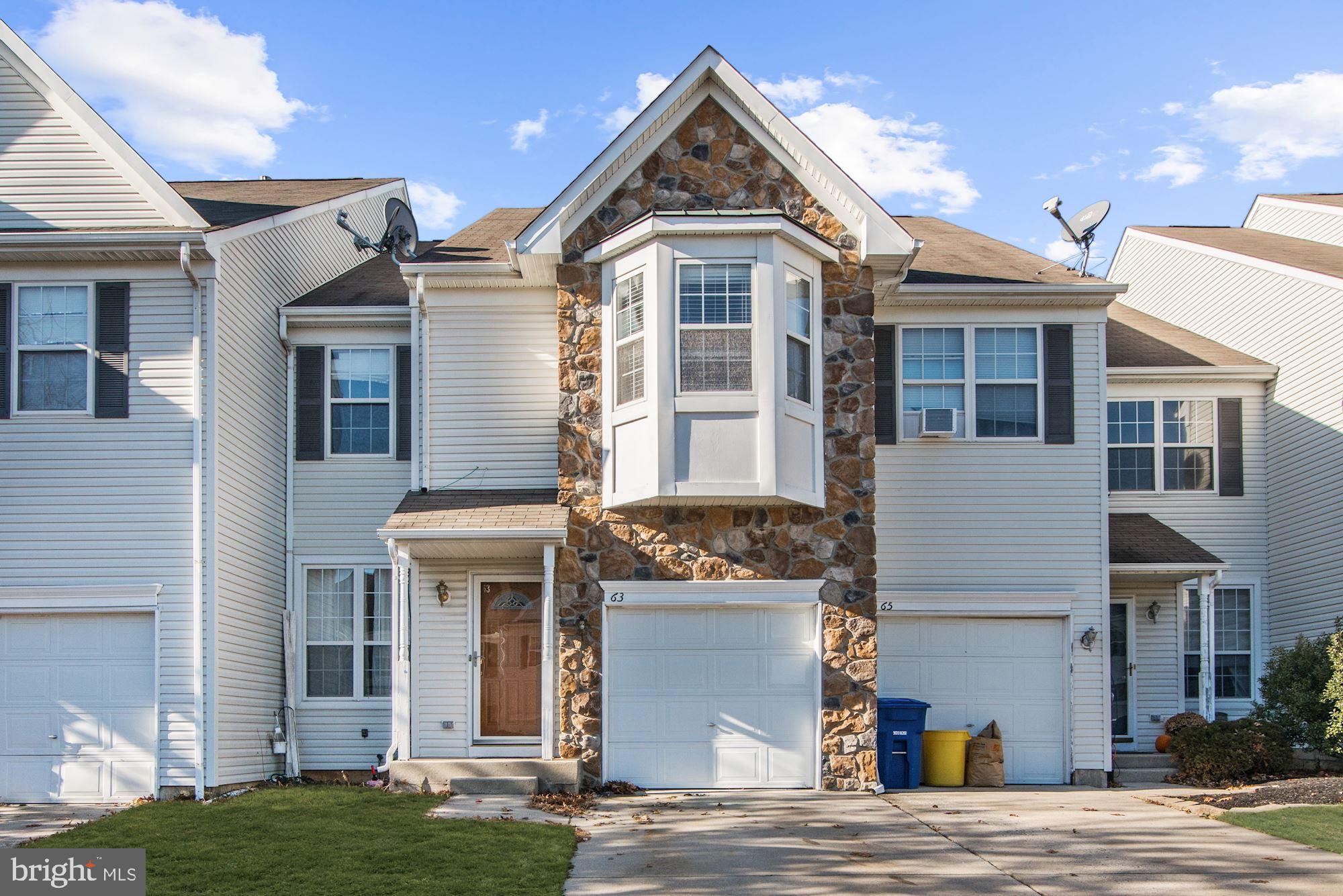 63 Threadleaf Terrace Burlington, NJ 08016 - Photo 1 of 34 a front view of a house with a yard