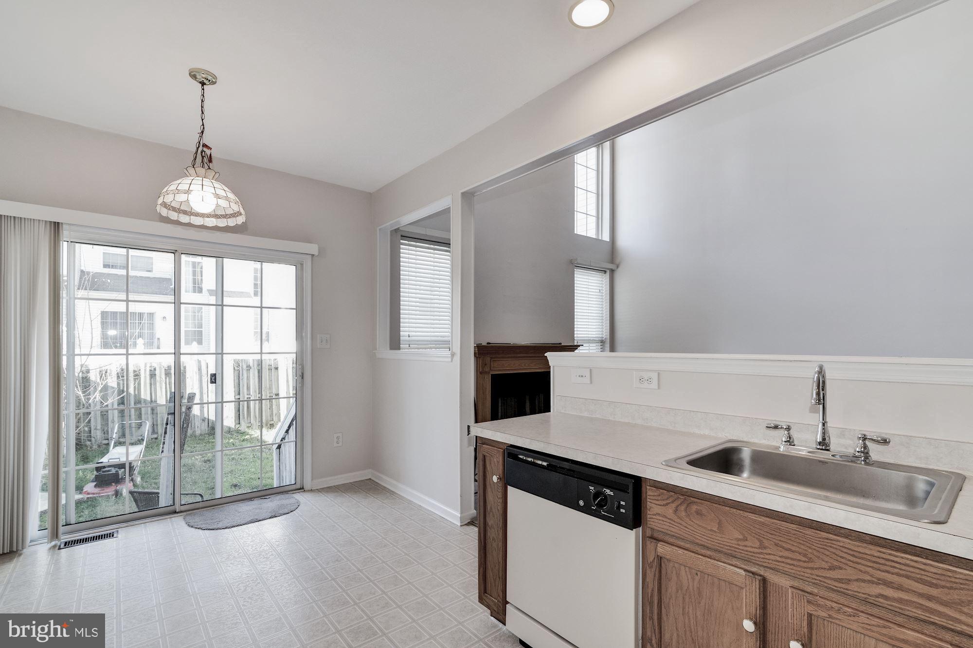 63 Threadleaf Terrace Burlington, NJ 08016 - Photo 16 of 34 a kitchen with a sink cabinets and window