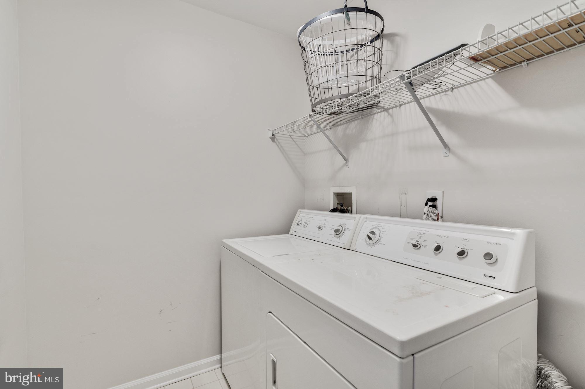 63 Threadleaf Terrace Burlington, NJ 08016 - Photo 30 of 34 a utility room with dryer and washer