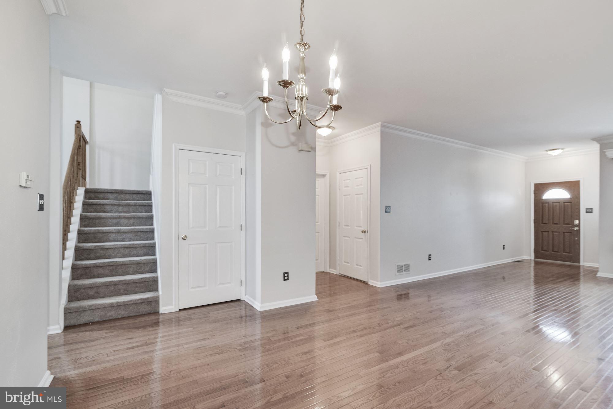 63 Threadleaf Terrace Burlington, NJ 08016 - Photo 7 of 34 wooden floor in an empty room with a window