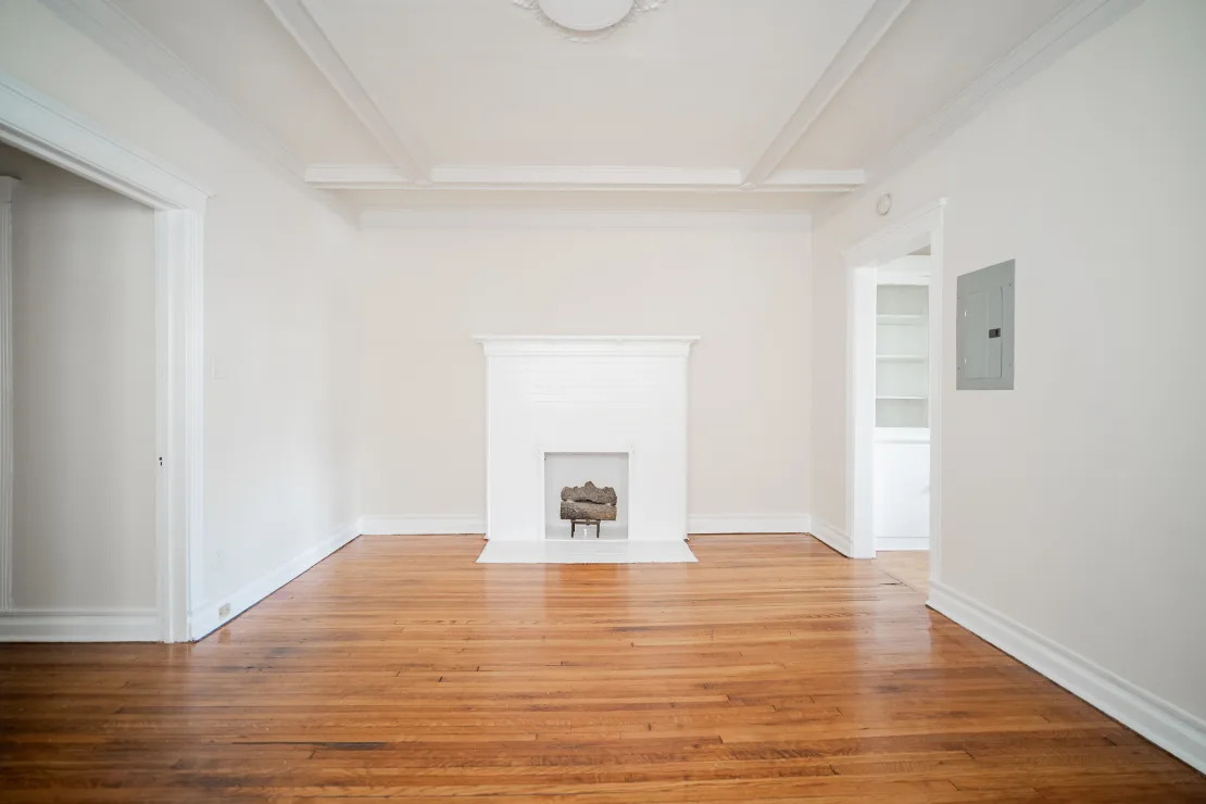 5124 South University Avenue Chicago, IL 60615 - Photo 6 of 8 a view of a livingroom with wooden floor