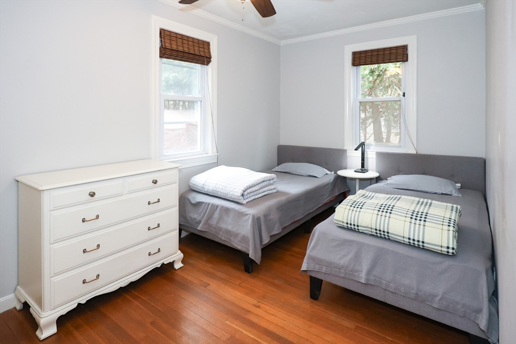 170 New Estate Road Littleton, MA 01460 - Photo 15 of 28 a bedroom with two beds and a window