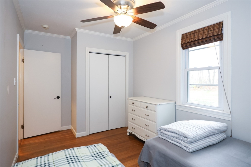170 New Estate Road Littleton, MA 01460 - Photo 16 of 28 a bedroom with a bed and a window