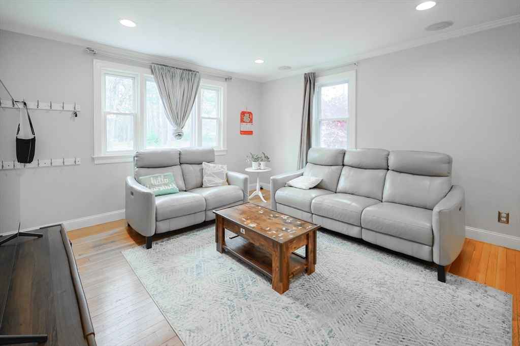 170 New Estate Road Littleton, MA 01460 - Photo 4 of 28 a living room with furniture and a large window