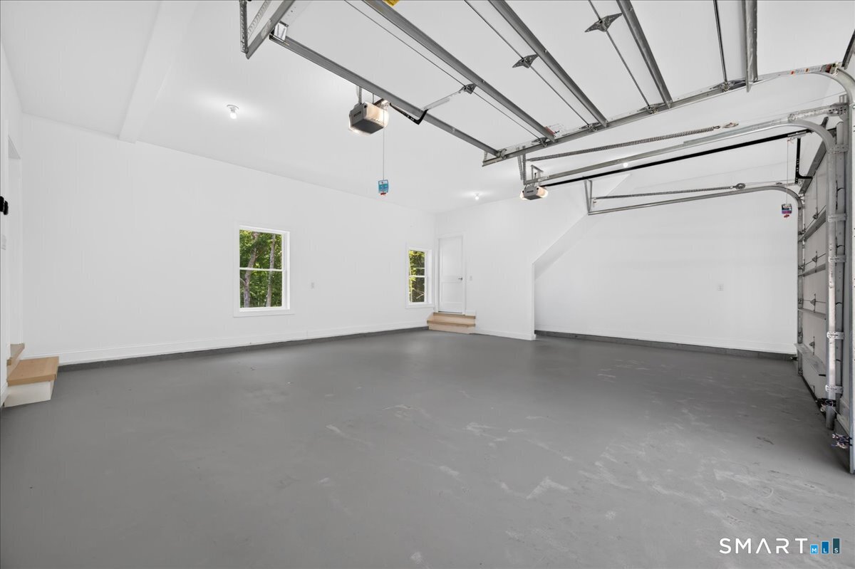 123 Scott Road East Lyme, CT 06333 - Photo 35 of 39 Spacious garage with tall ceilings