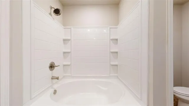 a bathroom with a bathtub