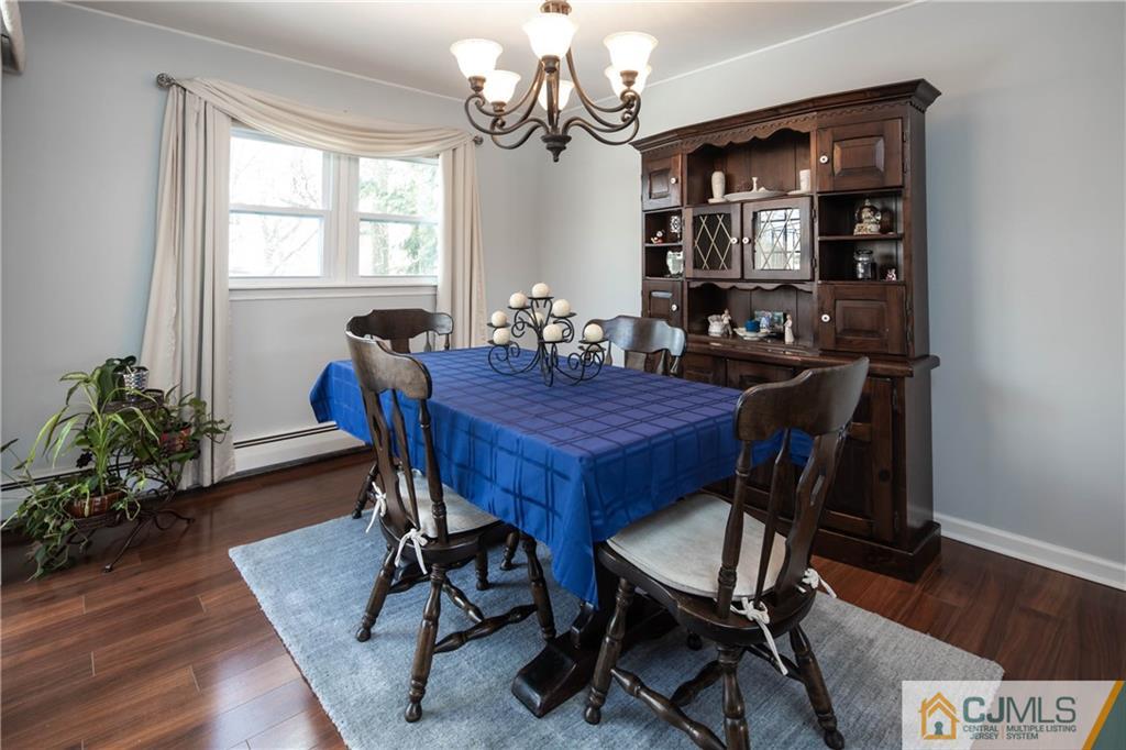 207 South Hill Road Colonia, NJ 07067 - Photo 17 of 47 a view of a dining room with furniture and window