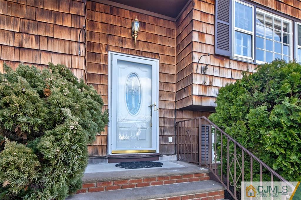 207 South Hill Road Colonia, NJ 07067 - Photo 4 of 47 a view of a building with a door