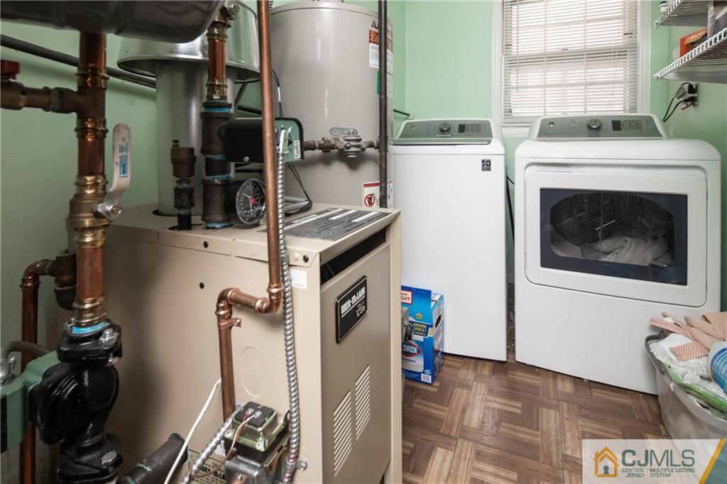 207 South Hill Road Colonia, NJ 07067 - Photo 31 of 47 a room with storage and utility