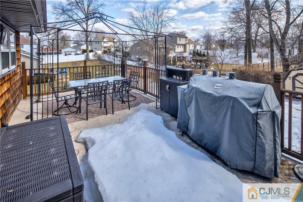 207 South Hill Road Colonia, NJ 07067 - Photo 32 of 47 a view of a patio with wooden floor