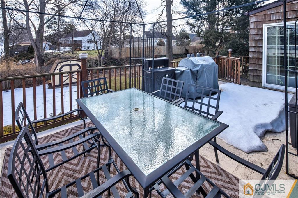 207 South Hill Road Colonia, NJ 07067 - Photo 33 of 47 a balcony with table and chairs
