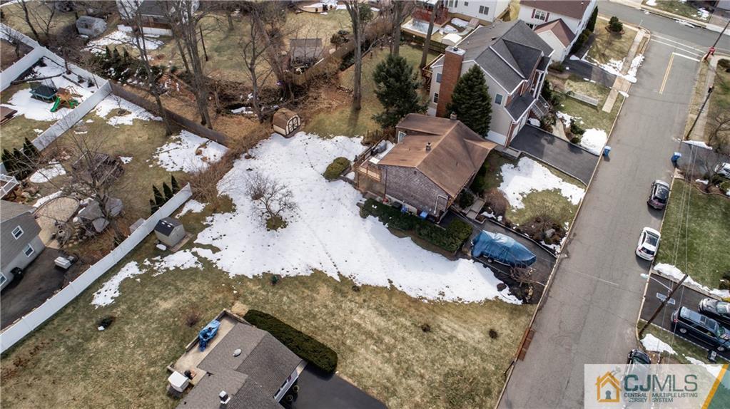 207 South Hill Road Colonia, NJ 07067 - Photo 43 of 47 an aerial view of a house with a yard