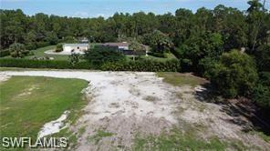 4792 11th Avenue Southwest Naples, FL 34116 - Photo 5 of 8 a view of a backyard
